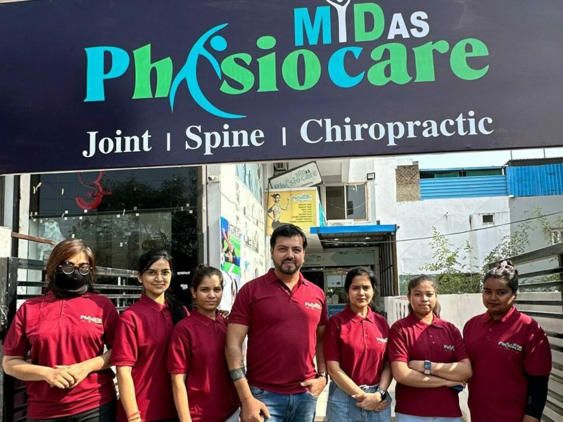 Midas Physiocare clinic exterior and team in Indore