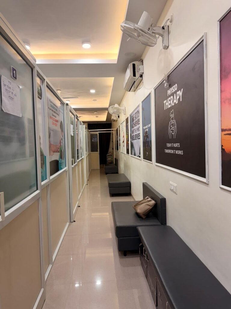 Clinic corridor with treatment cubicles at Midas Physiocare